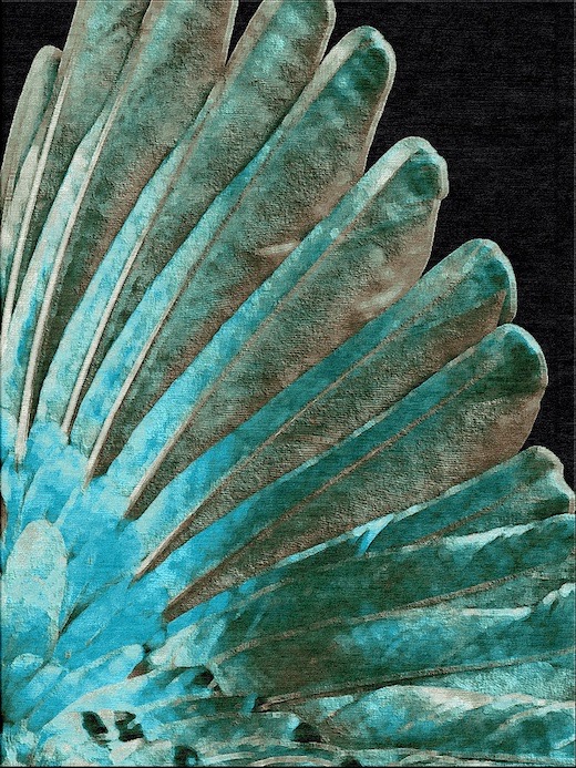 Rug with black background with teal feather design